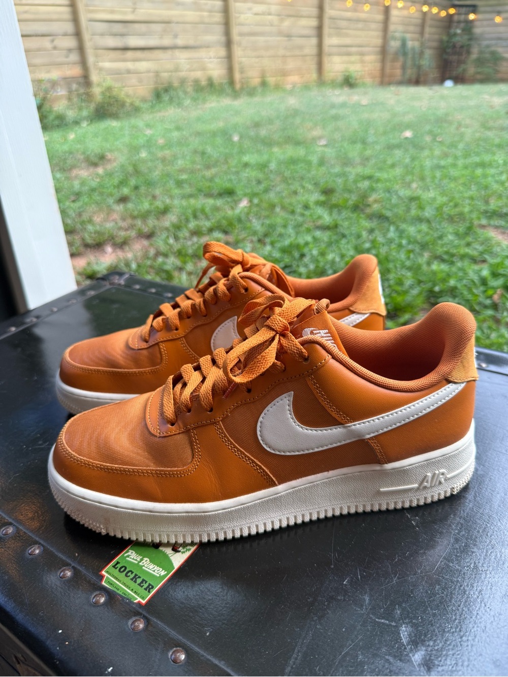 Nike Men’s Orange Low-Top Sneakers with White Swoosh